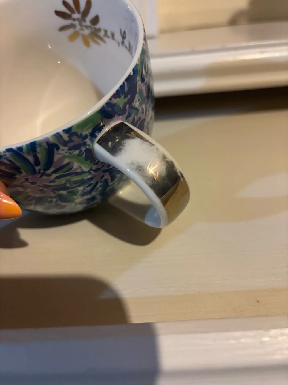 Pretty Lilly Pulitzer mug in blue, purple & teal. Some wear on handle. Large.